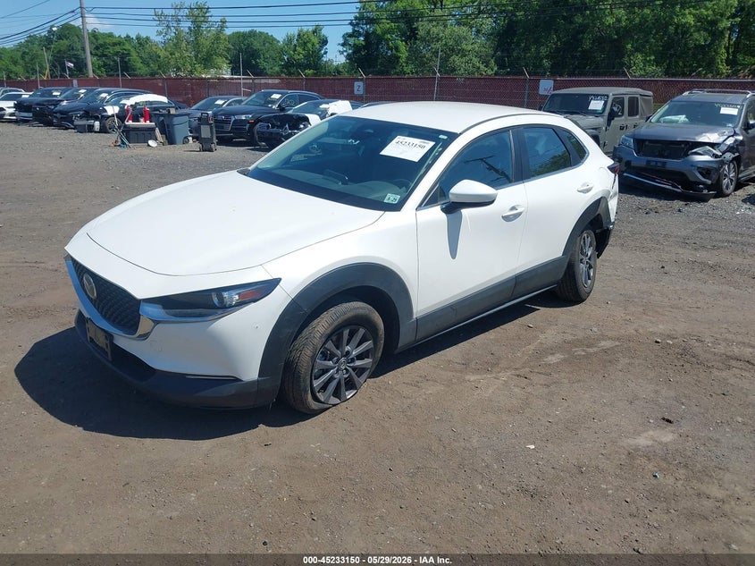 2024 Mazda Cx-30 VIN 3MVDMBAM9RM668651 IAAI salvage auction — SIDE, Salvage Title, sold $4,950 on 2026-07-10 (photo 2)
