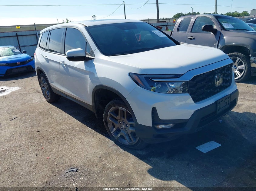 2023 Honda Passport VIN 5FNYF8H54PB030095 — IAAI salvage auction photo
