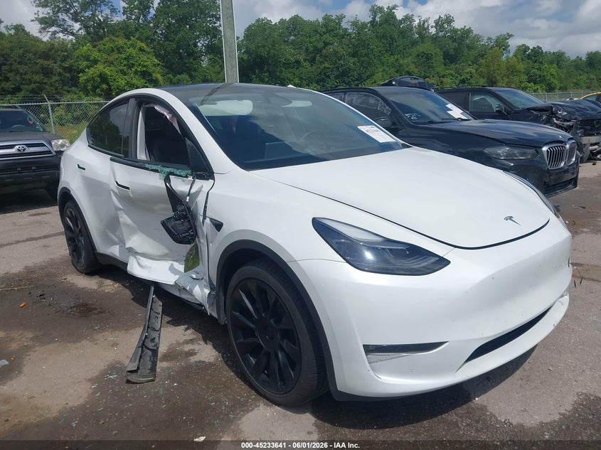 2023 Tesla Model y VIN 7SAYGAEE4PF864525 IAAI salvage auction — SIDE, Salvage (Louisiana), sold $11,250 on 2026-07-07 (photo 1)