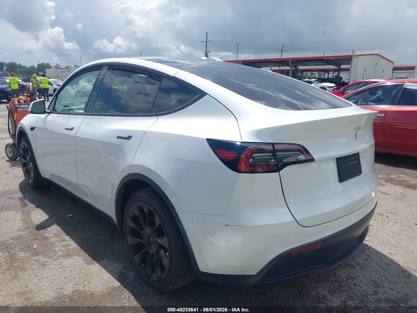 2023 Tesla Model y VIN 7SAYGAEE4PF864525 IAAI salvage auction — SIDE, Salvage (Louisiana), sold $11,250 on 2026-07-07 (photo 3)