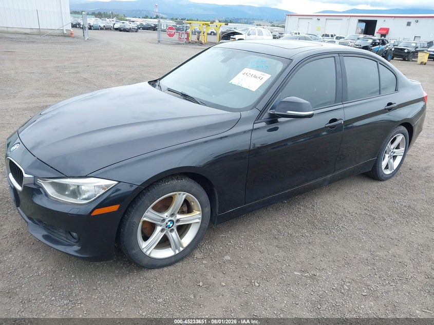 2013 BMW 3er VIN WBA3B5C56DF597957 IAAI salvage auction — NORMAL WEAR, Clear (Idaho), sold $500 on 2026-07-14 (photo 2)