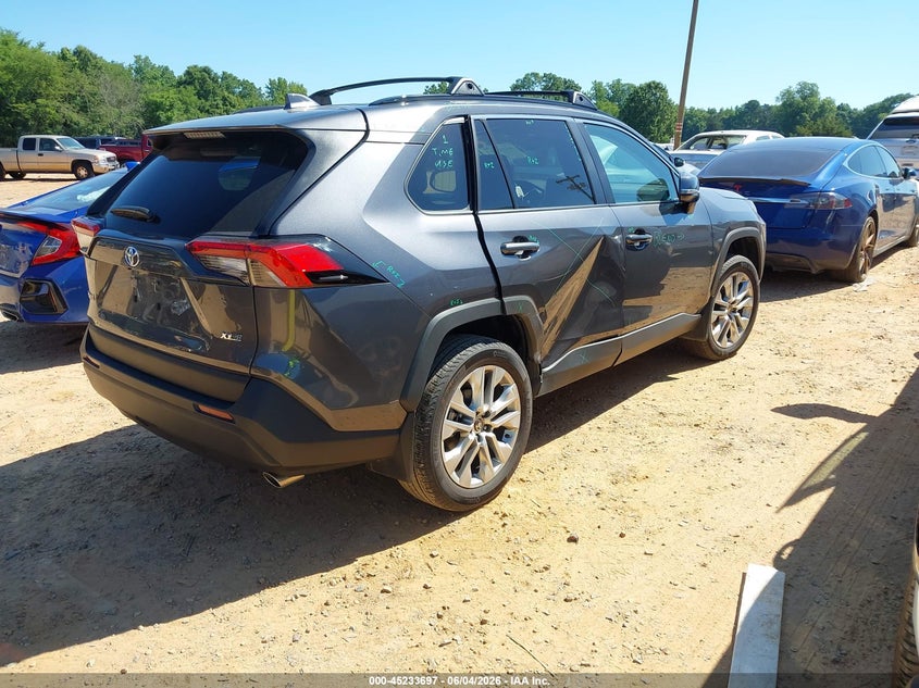 2025 Toyota Rav 4 VIN 2T3C1RFV5SC311053 IAAI salvage auction — SIDE, Salvage Title, sold $14,700 on 2026-07-31 (photo 4)