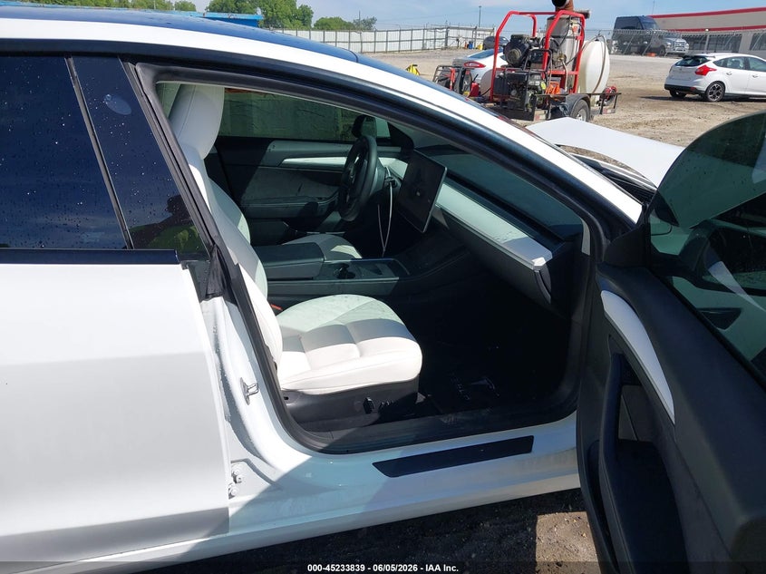 2023 Tesla Model 3 VIN 5YJ3E1EA0PF563194 IAAI salvage auction — FRONT END, Salvage Title, sold $8,100 on 2026-07-11 (photo 5)