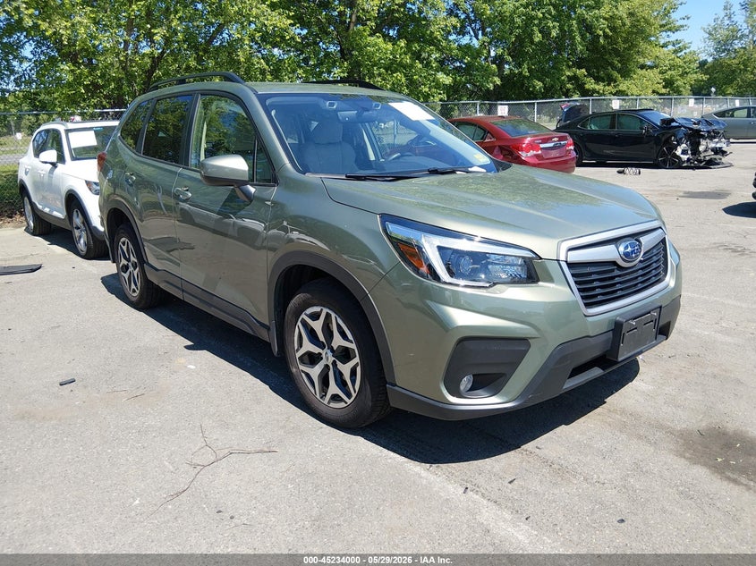 2021 Subaru Forester VIN JF2SKAJC8MH521736 IAAI salvage auction — SIDE, Salvage Title, sold $7,400 on 2026-07-20 (photo 1)