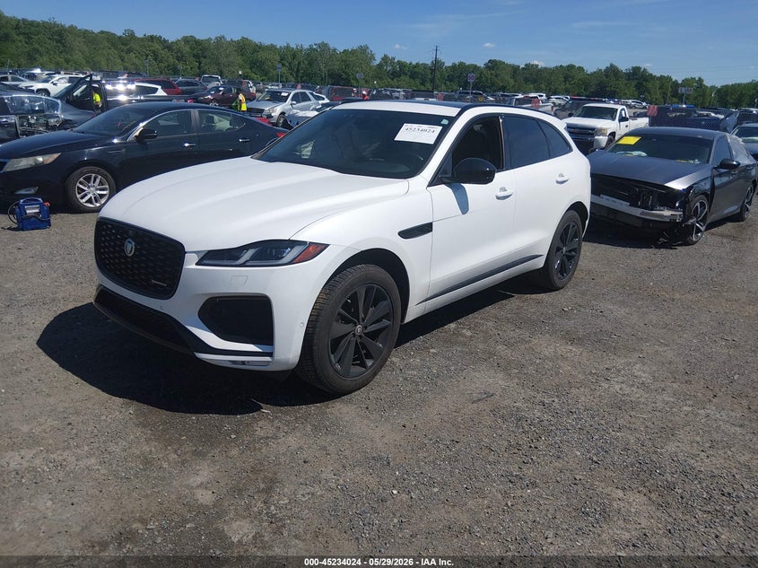 2024 Jaguar F-pace VIN SADCT2EX7RA735897 IAAI salvage auction — SIDE, Salvage Title, sold $13,000 on 2026-08-01 (photo 2)
