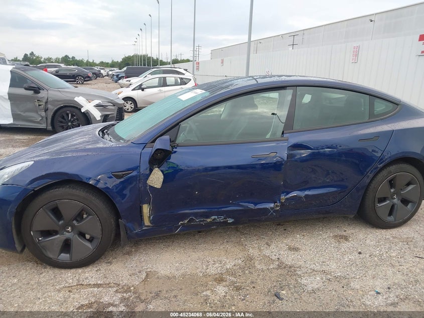 2023 Tesla Model 3 VIN 5YJ3E1EA0PF659374 IAAI salvage auction — REAR END, Salvage Title, sold $11,375 on 2026-07-16 (photo 6)