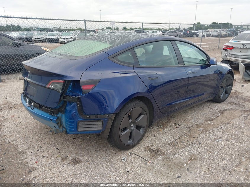 2023 Tesla Model 3 VIN 5YJ3E1EA0PF659374 IAAI salvage auction — REAR END, Salvage Title, sold $11,375 on 2026-07-16 (photo 4)