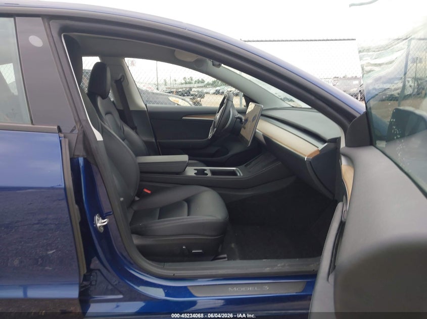 2023 Tesla Model 3 VIN 5YJ3E1EA0PF659374 IAAI salvage auction — REAR END, Salvage Title, sold $11,375 on 2026-07-16 (photo 5)