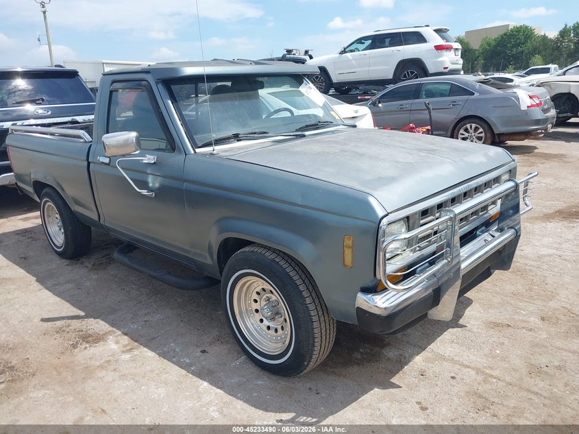 1987 Ford Ranger VIN 1FTBR10AXHUB52305 IAAI salvage auction — REAR END, Clear (Oklahoma), sold $575 on 2026-07-08 (photo 1)
