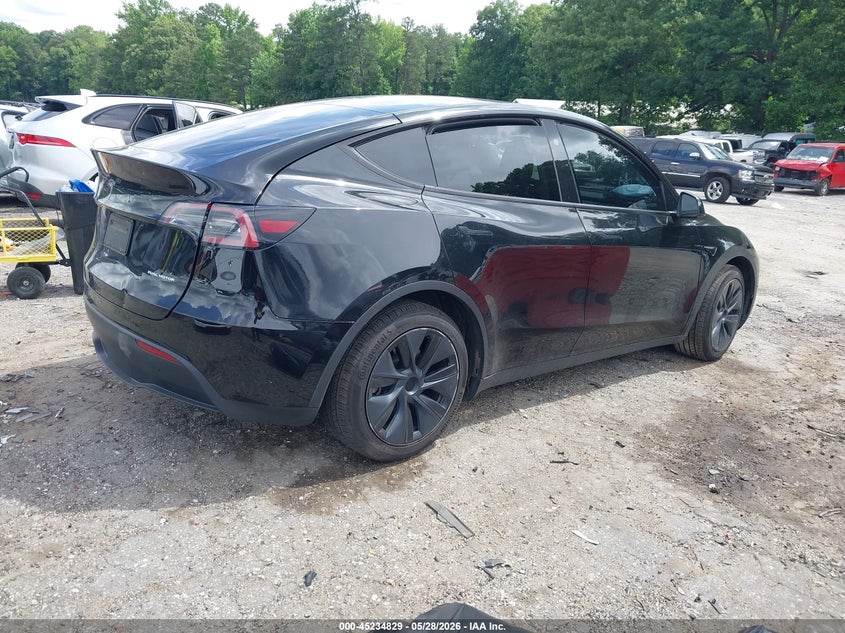 2024 Tesla Model y VIN 7SAYGAEE7RF179728 IAAI salvage auction — LEFT SIDE, Salvage (Georgia), sold $9,200 on 2026-07-29 (photo 4)
