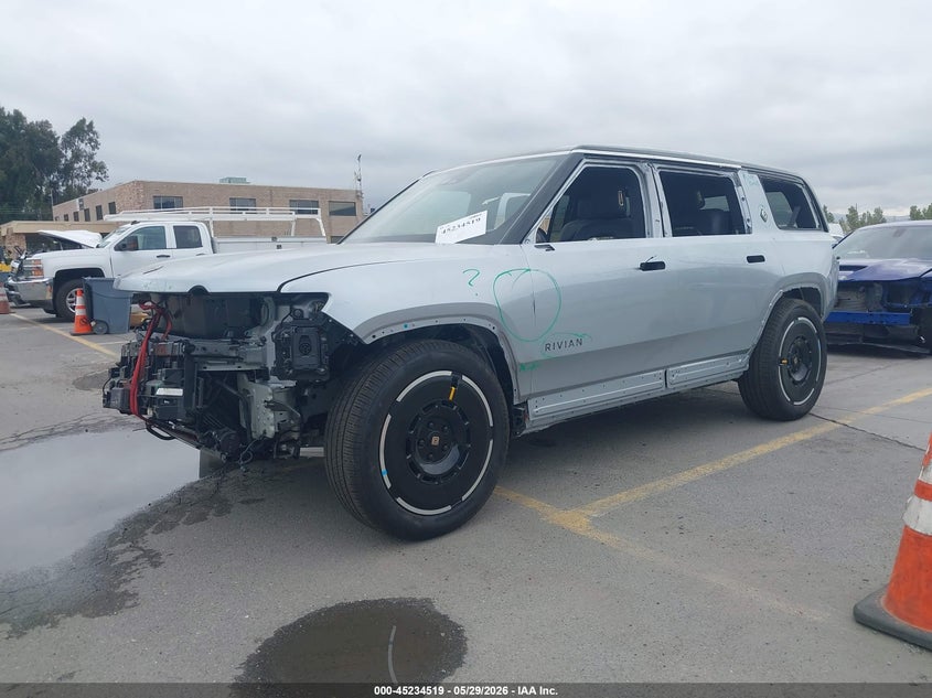 2025 Rivian R1s VIN 7PDSGBBAXSN052871 IAAI salvage auction — FRONT & REAR, Salvage Title, sold $20,200 on 2026-08-31 (photo 2)