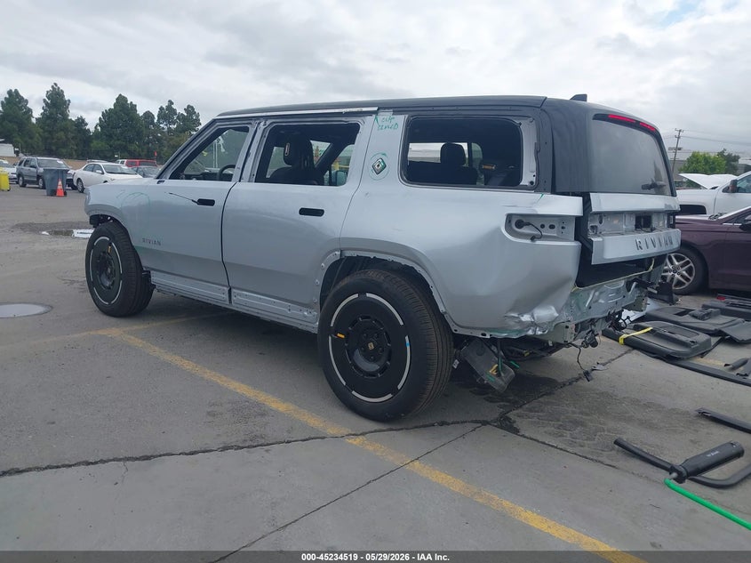 2025 Rivian R1s VIN 7PDSGBBAXSN052871 IAAI salvage auction — FRONT & REAR, Salvage Title, sold $20,200 on 2026-08-31 (photo 3)