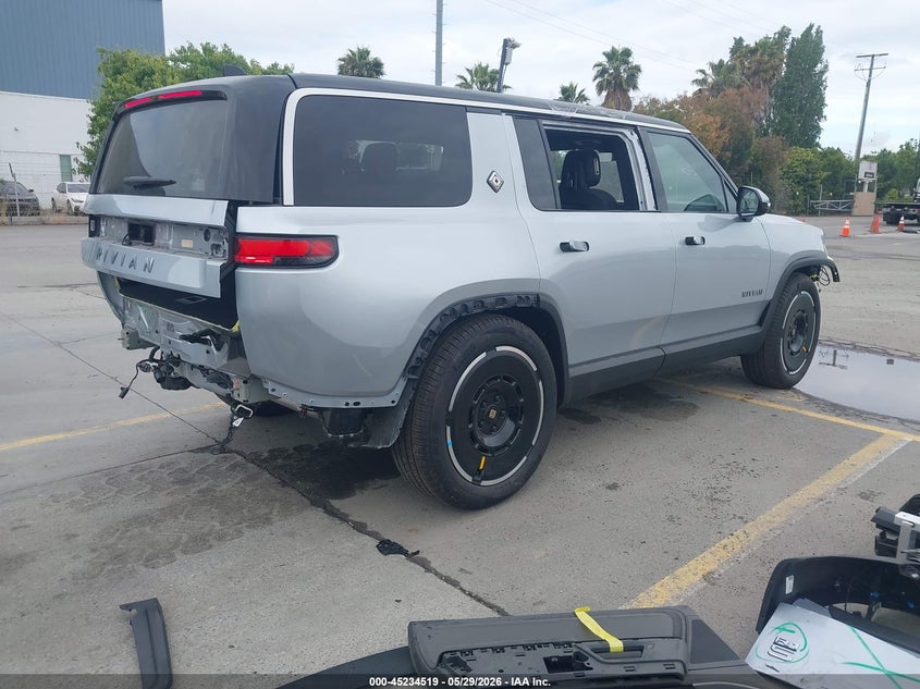 2025 Rivian R1s VIN 7PDSGBBAXSN052871 IAAI salvage auction — FRONT & REAR, Salvage Title, sold $20,200 on 2026-08-31 (photo 4)