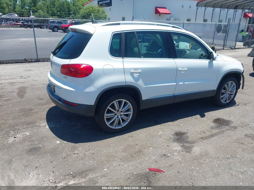 2016 Volkswagen Tiguan VIN WVGAV7AX0GW585255 IAAI salvage auction — LEFT SIDE, Salvage Title, sold $1,225 on 2026-07-21 (photo 4)