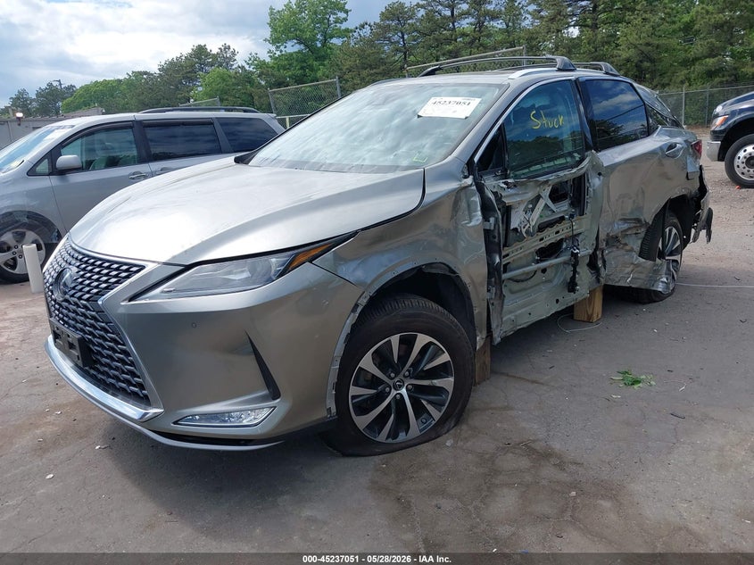 2022 Lexus Rx VIN 2T2HGMDA7NC089888 IAAI salvage auction — LEFT SIDE, Salvage Title, sold $14,200 on 2026-08-29 (photo 2)