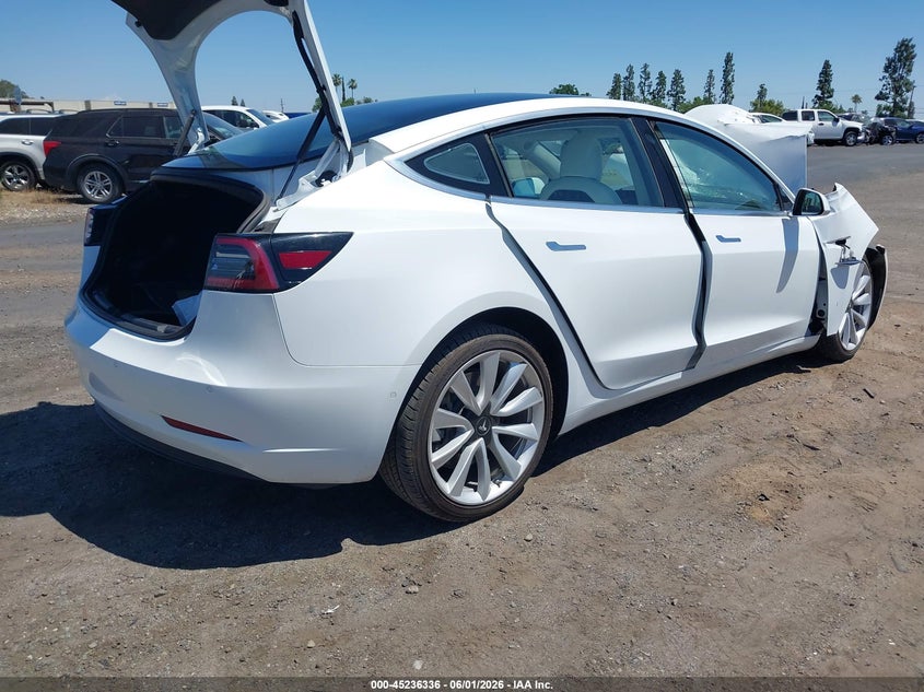 2018 Tesla Model 3 VIN 5YJ3E1EA5JF169701 IAAI salvage auction — RIGHT FRONT, Salvage Title, sold $2,850 on 2026-07-10 (photo 4)