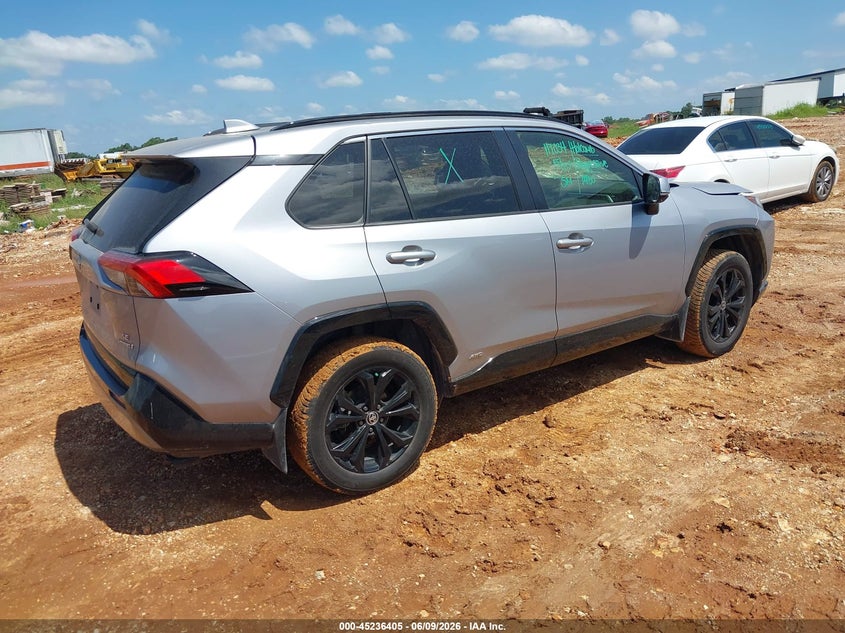 2022 Toyota Rav 4 VIN JTM16RFVXND050706 IAAI salvage auction — HAIL, Salvage Title, sold $14,000 on 2026-07-06 (photo 4)