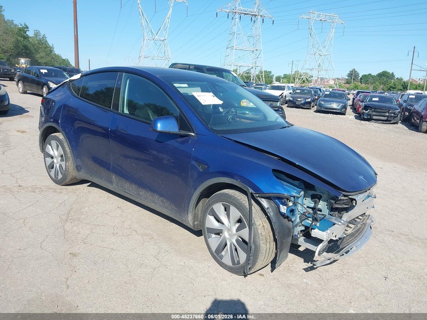2023 Tesla Model y VIN 7SAYGDEE2PA170009 — IAAI salvage auction photo