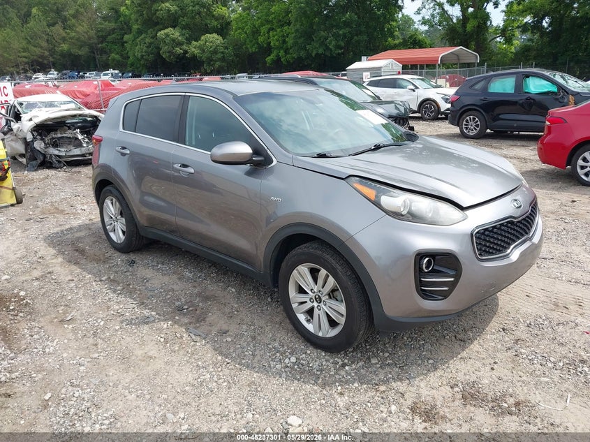 2018 Kia Sportage VIN KNDPMCAC7J7371016 IAAI salvage auction — LEFT SIDE, Salvage Title, sold $2,500 on 2026-07-17 (photo 1)