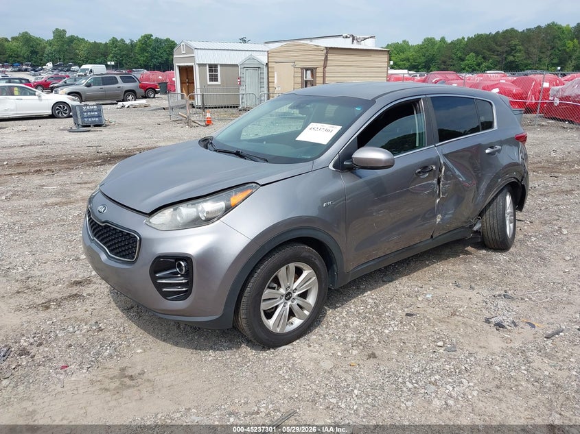 2018 Kia Sportage VIN KNDPMCAC7J7371016 IAAI salvage auction — LEFT SIDE, Salvage Title, sold $2,500 on 2026-07-17 (photo 2)