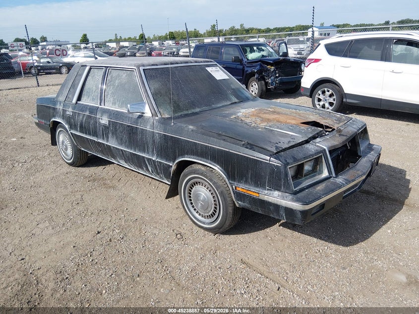 1985 Chrysler Lebaron VIN 1C3BC56D3FF201537 IAAI salvage auction — ENGINE BURN, Salvage (Illinois), sold $200 on 2026-07-08 (photo 1)