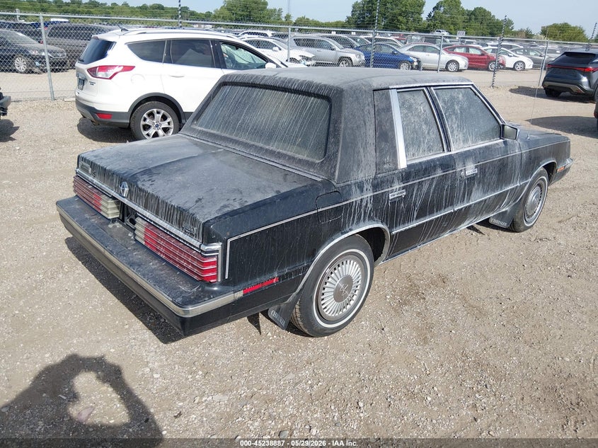 1985 Chrysler Lebaron VIN 1C3BC56D3FF201537 IAAI salvage auction — ENGINE BURN, Salvage (Illinois), sold $200 on 2026-07-08 (photo 4)