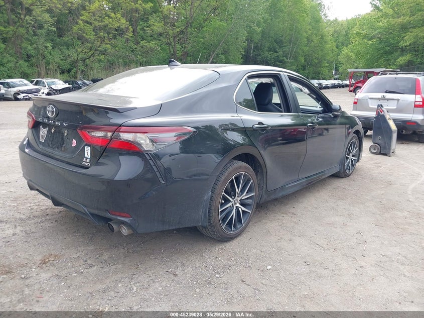 2023 Toyota Camry VIN 4T1G11BK5PU077509 IAAI salvage auction — SIDE, Salvage Title, sold $5,900 on 2026-07-18 (photo 4)