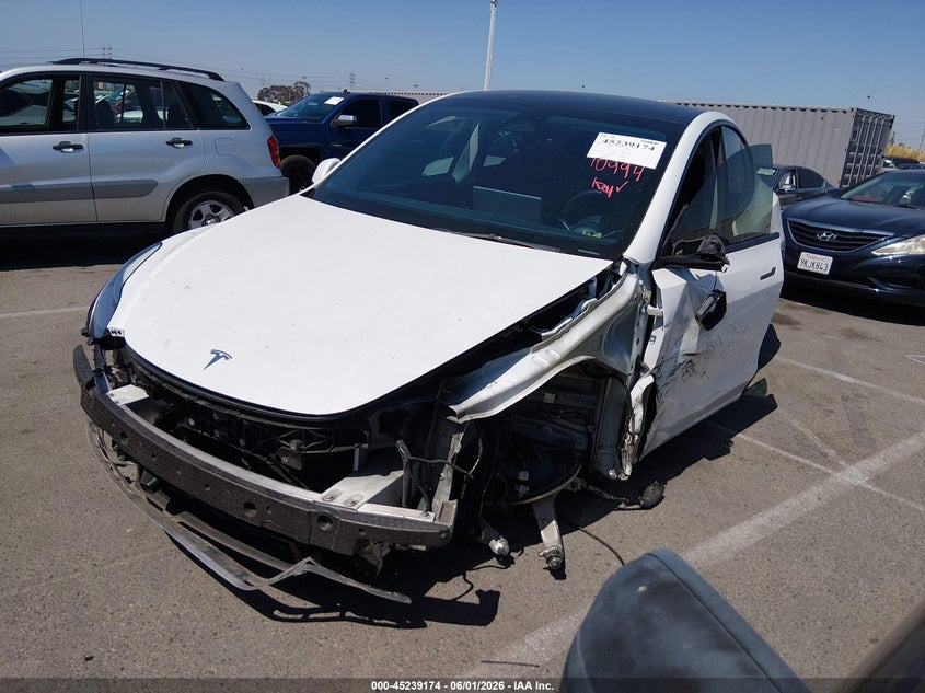 2023 Tesla Model y VIN 7SAYGDEE8PA025301 IAAI salvage auction — LEFT FRONT, Salvage (California), sold $9,325 on 2026-07-29 (photo 2)