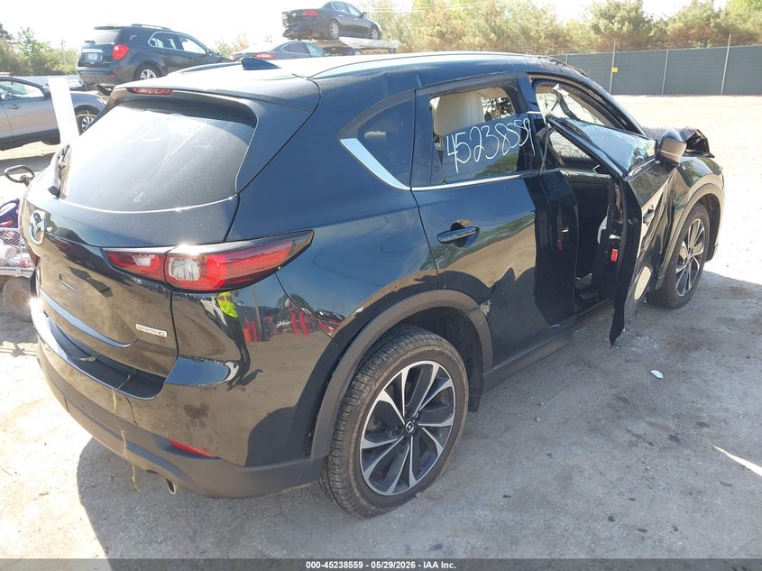 2022 Mazda Cx-5 VIN JM3KFBDM0N1596168 IAAI salvage auction — ROLLOVER, Salvage Title, sold $1,300 on 2026-07-28 (photo 4)