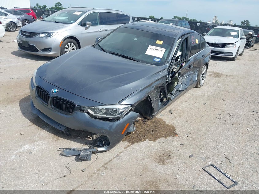 2018 BMW 3er VIN WBA8B9G59JNU96355 IAAI salvage auction — BIO HAZARD, Salvage Title, sold $2,175 on 2026-07-21 (photo 2)