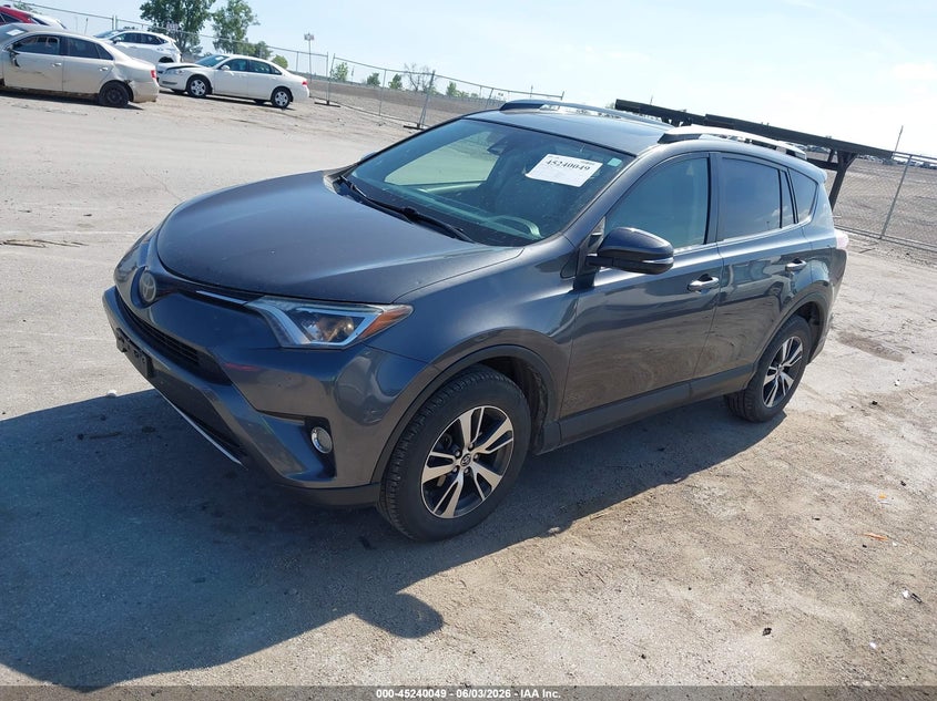 2017 Toyota Rav 4 VIN JTMRFREV8HD203429 IAAI salvage auction — HAIL, Salvage Title, sold $4,850 on 2026-07-28 (photo 2)