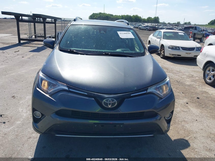 2017 Toyota Rav 4 VIN JTMRFREV8HD203429 IAAI salvage auction — HAIL, Salvage Title, sold $4,850 on 2026-07-28 (photo 6)