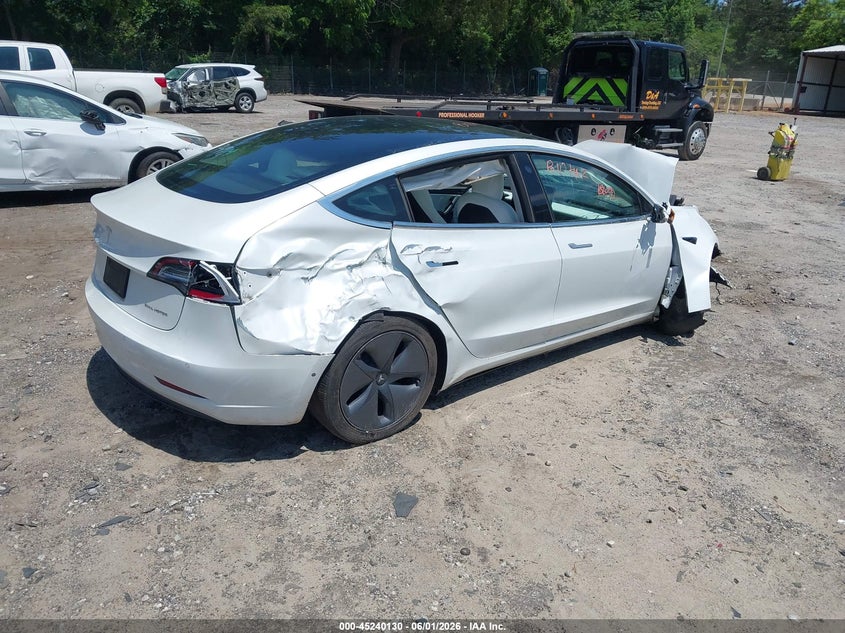 2019 Tesla Model 3 VIN 5YJ3E1EB3KF494714 IAAI salvage auction — BIO HAZARD, Salvage Title, sold $2,750 on 2026-07-24 (photo 4)