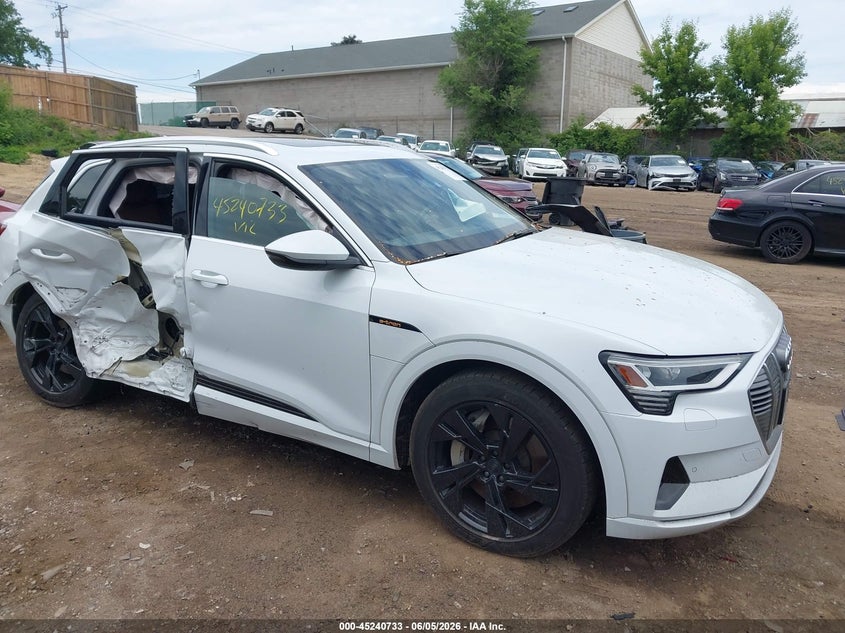 2021 Audi E-tron VIN WA1AAAGE1MB003034 IAAI salvage auction — SIDE, Salvage (Minnesota), sold $8,300 on 2026-07-31 (photo 1)