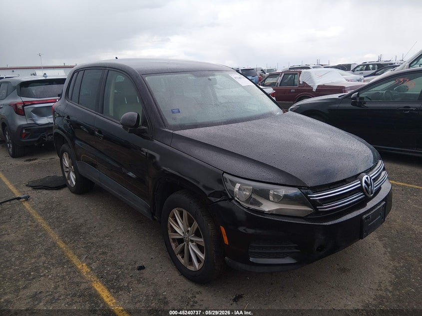 2014 Volkswagen Tiguan VIN WVGBV3AX7EW553171 IAAI salvage auction — NORMAL WEAR, Clear (Colorado), sold $1,100 on 2026-07-14 (photo 1)