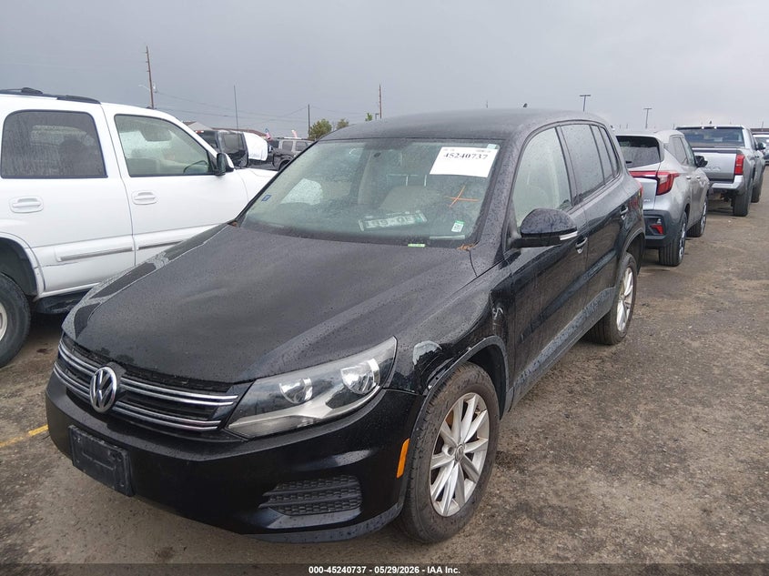 2014 Volkswagen Tiguan VIN WVGBV3AX7EW553171 IAAI salvage auction — NORMAL WEAR, Clear (Colorado), sold $1,100 on 2026-07-14 (photo 2)