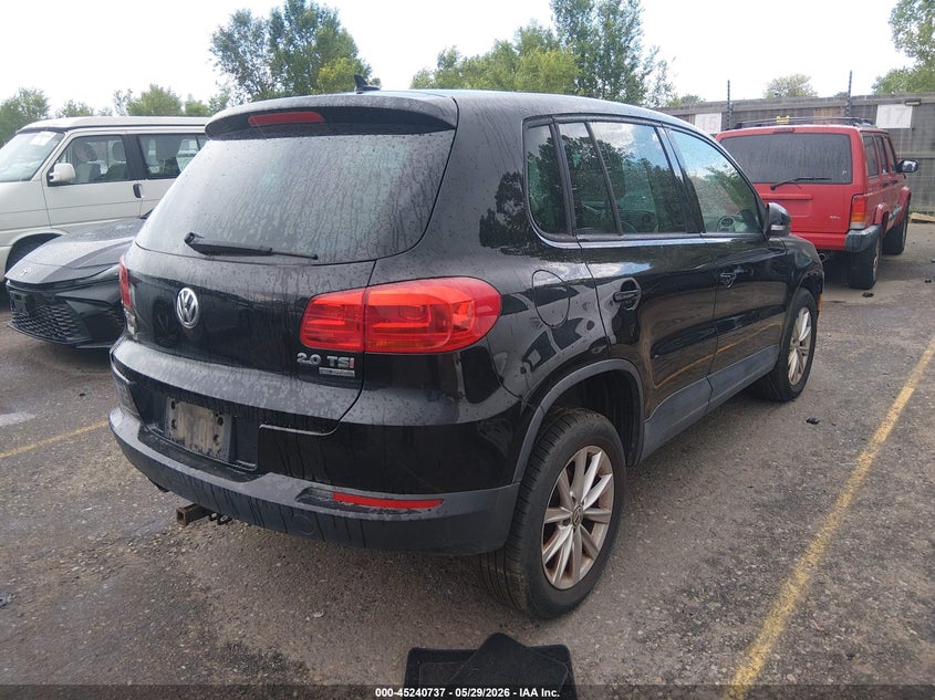 2014 Volkswagen Tiguan VIN WVGBV3AX7EW553171 IAAI salvage auction — NORMAL WEAR, Clear (Colorado), sold $1,100 on 2026-07-14 (photo 4)