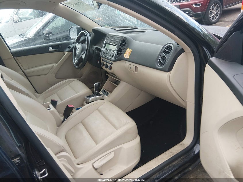 2014 Volkswagen Tiguan VIN WVGBV3AX7EW553171 IAAI salvage auction — NORMAL WEAR, Clear (Colorado), sold $1,100 on 2026-07-14 (photo 5)