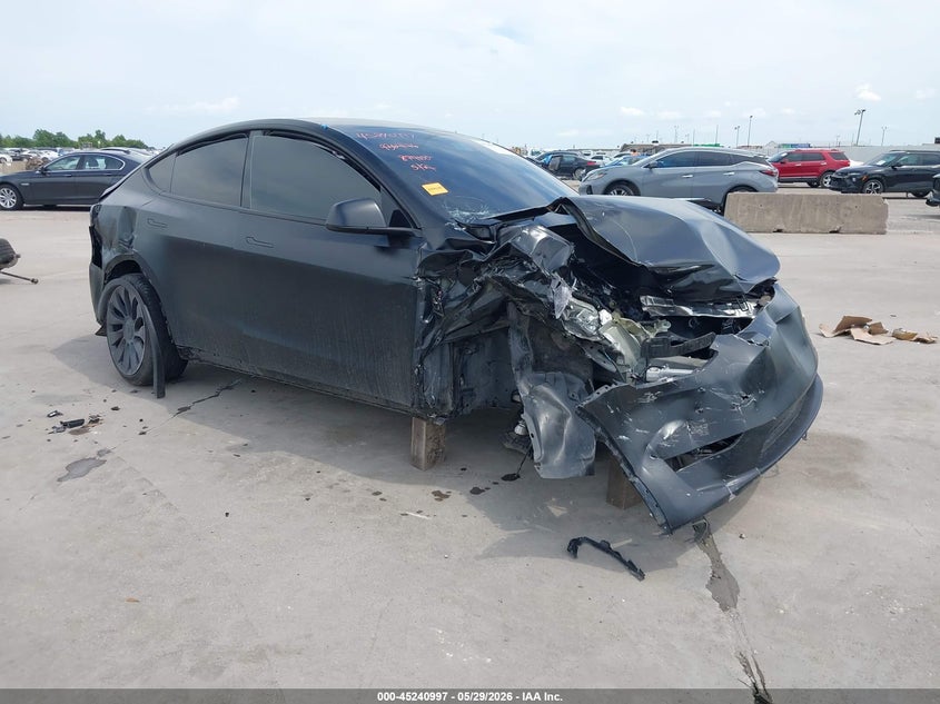 2023 Tesla Model y VIN 7SAYGAEE7PF874000 IAAI salvage auction — RIGHT SIDE, Salvage Title, sold $4,550 on 2026-07-22 (photo 1)