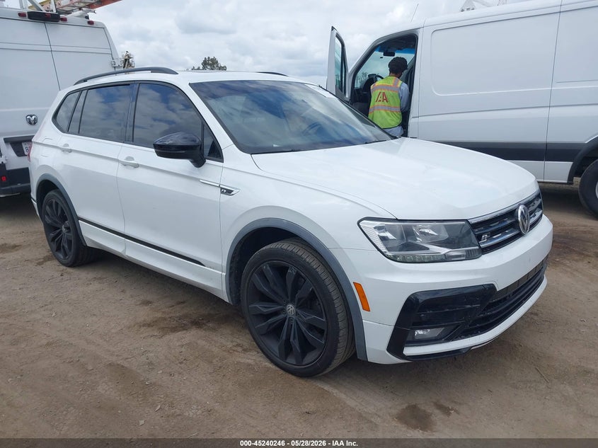 2020 Volkswagen Tiguan VIN 3VV3B7AX0LM115566 IAAI salvage auction — SIDE, Salvage Title, sold $5,700 on 2026-08-10 (photo 1)