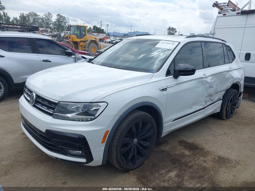 2020 Volkswagen Tiguan VIN 3VV3B7AX0LM115566 IAAI salvage auction — SIDE, Salvage Title, sold $5,700 on 2026-08-10 (photo 2)