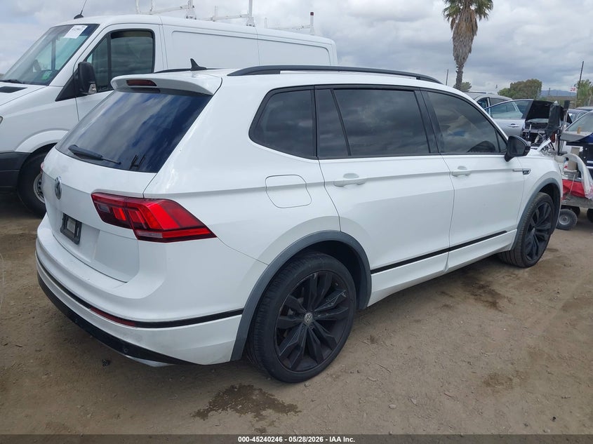 2020 Volkswagen Tiguan VIN 3VV3B7AX0LM115566 IAAI salvage auction — SIDE, Salvage Title, sold $5,700 on 2026-08-10 (photo 4)