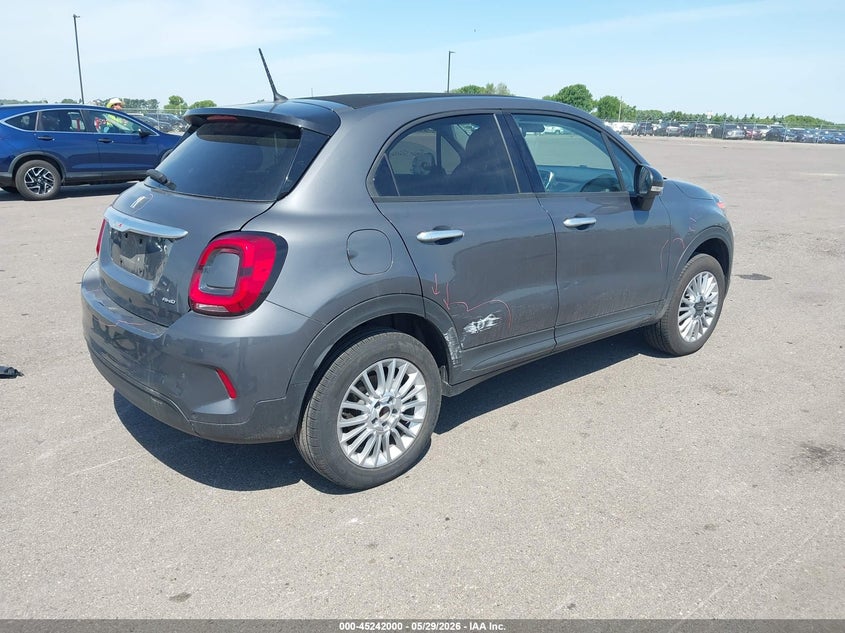 2023 Fiat 500x VIN ZFBNF3B13PP989122 IAAI salvage auction — SIDE, Salvage Title, sold $4,850 on 2026-08-02 (photo 4)