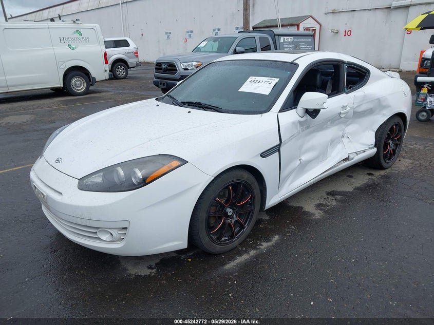2008 Hyundai Tiburon VIN KMHHN66FX8U286863 IAAI salvage auction — SIDE, Salvage (Oregon), sold $200 on 2026-07-29 (photo 2)