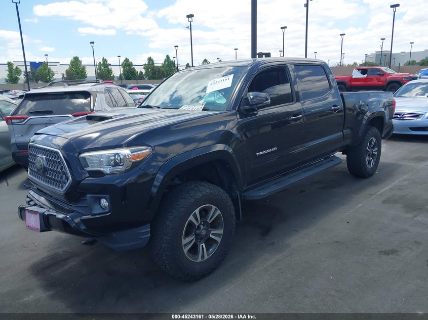 2018 Toyota Tacoma VIN 3TMDZ5BN3JM054100 IAAI salvage auction — FRONT & REAR, Salvage Certificate (California), sold $14,250 on 2026-07-31 (photo 2)