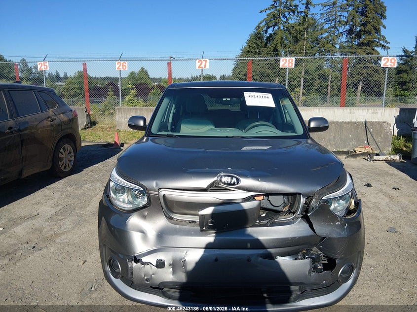2018 Kia Soul ev + VIN KNDJP3AEXJ7032362 IAAI salvage auction — FRONT & REAR, Salvage Title, sold $725 on 2026-07-16 (photo 6)