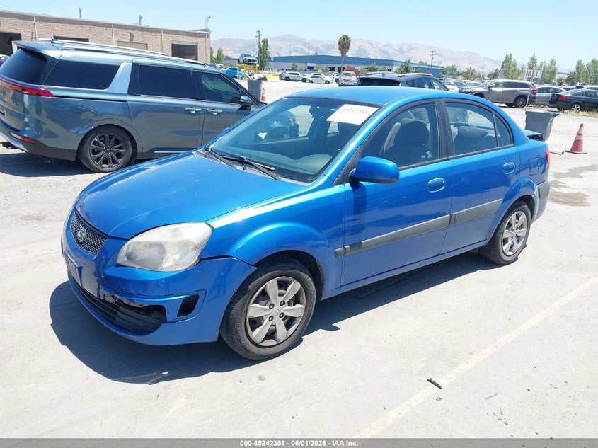 2009 Kia Rio VIN KNADE223796486366 IAAI salvage auction — REAR END, Salvage (California), sold $250 on 2026-07-20 (photo 2)