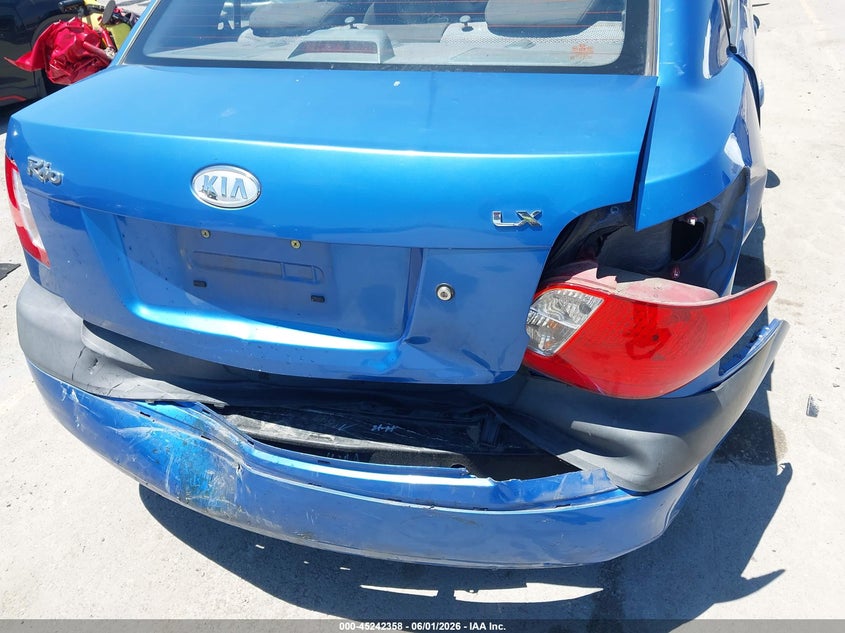 2009 Kia Rio VIN KNADE223796486366 IAAI salvage auction — REAR END, Salvage (California), sold $250 on 2026-07-20 (photo 6)