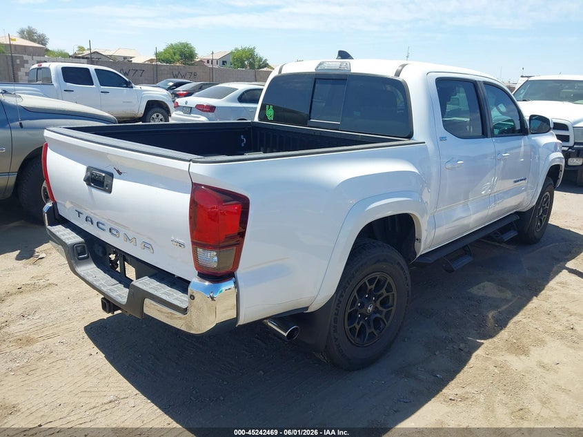 2021 Toyota Tacoma VIN 5TFAZ5CN4MX109508 IAAI salvage auction — SIDE, Salvage Title, sold $10,800 on 2026-07-21 (photo 4)