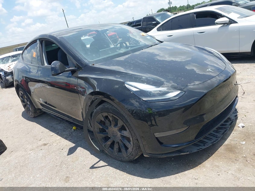 2023 Tesla Model y VIN 7SAYGDEE2PA186100 — IAAI salvage auction photo
